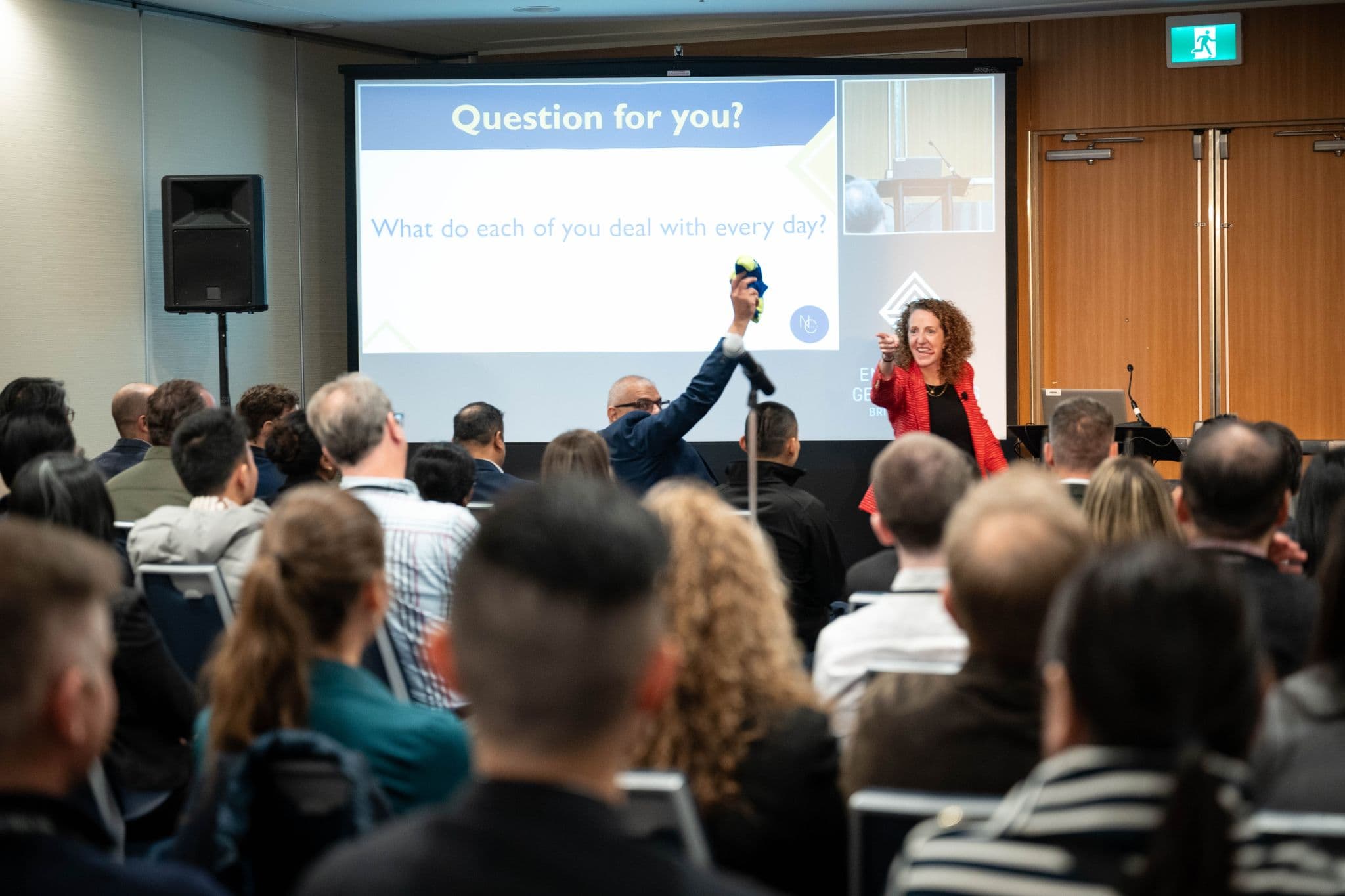 Negotiations Collective keynote speaker engaging a large audience