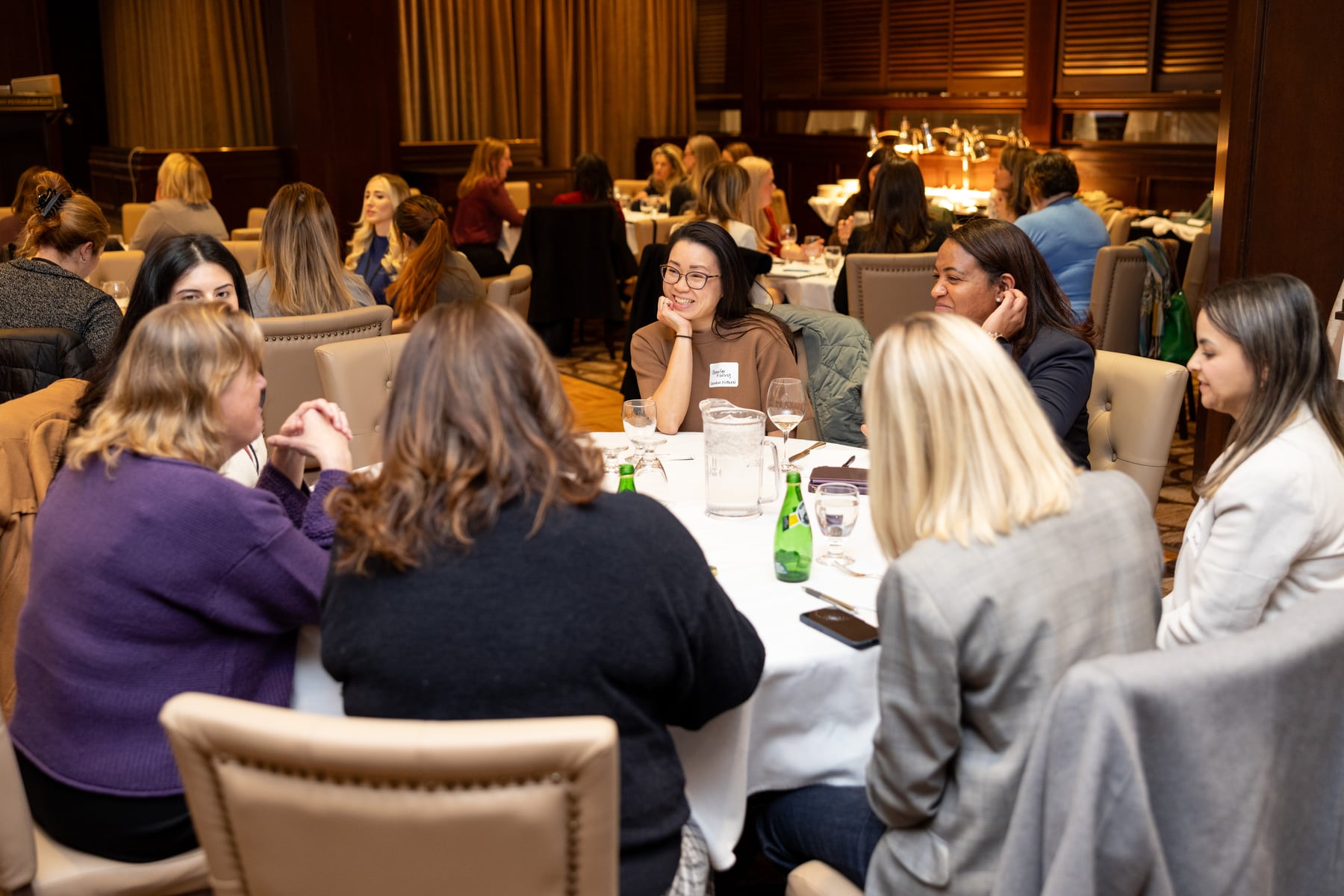 Participants discussing an exercise around a table